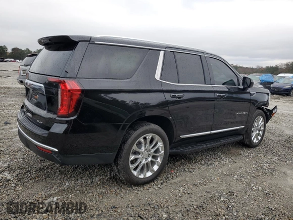2023 GMC Yukon SLT with VIN 1GKS2BKD7PR122685, listed as a Copart auction lot 84611444 with 52,271 mi miles and Salvage Title. Bid and sale history available at carsss.com. Image 3.