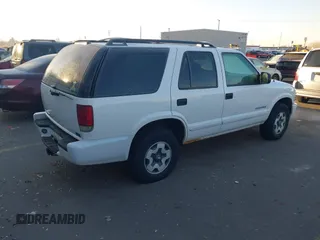 2004 Chevrolet Blazer LS z VIN 1GNDT13X34K161001, wystawiony jako IAAI lot #41432856 z przebiegiem Nie podano mil oraz . Historia ofert i sprzedaży dostępna na DreamBid. Obrazek 4.