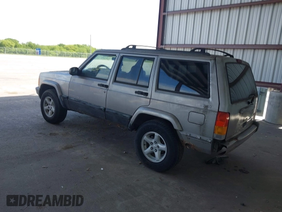 2000 Jeep Cherokee z VIN 1J4FF48S1YL273555, wystawiony jako IAAI lot #42249135 z przebiegiem 184 674 mil mil oraz . Historia ofert i sprzedaży dostępna na DreamBid. Obrazek 3.