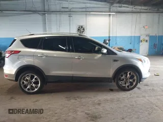 2015 Ford Escape Titanium z VIN 1FMCU9J96FUB23902, wystawiony jako IAAI lot #42497188 z przebiegiem 164 452 mil mil oraz . Historia ofert i sprzedaży dostępna na DreamBid. Obrazek 13.