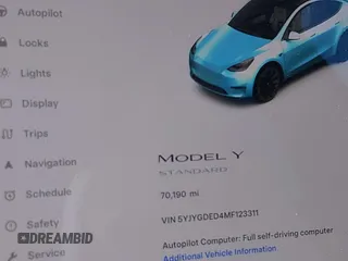 2021 Tesla Model Y Standard Range z VIN 5YJYGDED4MF123311, wystawiony jako IAAI lot #41200519 z przebiegiem 70 190 mil mil oraz . Historia ofert i sprzedaży dostępna na DreamBid. Obrazek 15.