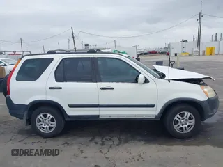 2003 Honda CR-V EX z VIN JHLRD78893C033020, wystawiony jako IAAI lot #42440473 z przebiegiem Nie podano mil oraz . Historia ofert i sprzedaży dostępna na DreamBid. Obrazek 13.