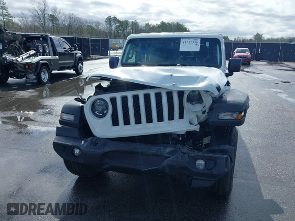 2023 Jeep Wrangler Sport S with VIN 1C4HJXDN9PW540842, listed as a IAAI auction lot 41712336 with 36,017 mi miles and . Bid and sale history available at DreamBid. Image 12.