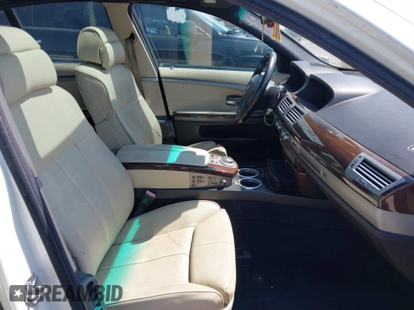 2006 BMW 7 Series 750i with VIN WBAHL83576DT03355, listed as a IAAI auction lot 42606906 with 186,494 mi miles and . Bid and sale history available at DreamBid. Image 5.