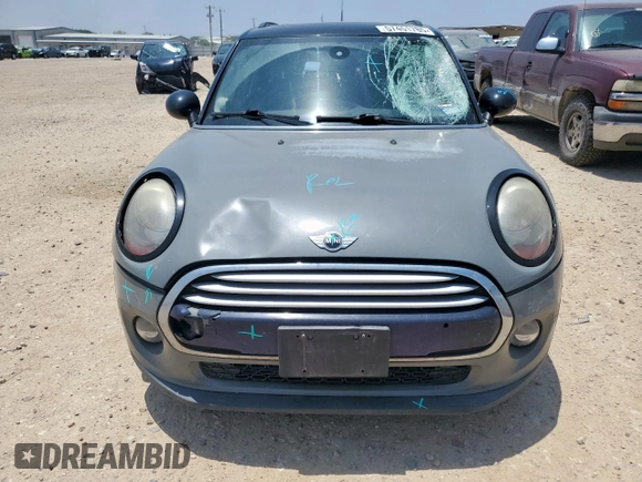 2015 MINI Hardtop 4 Door с VIN WMWXS5C51FT830794, выставлен на аукционе Copart как лот 57451785 с пробегом 171 669 миль миль и Списание • Salvage title. История ставок и продаж доступна на DreamBid. Изображение 5.