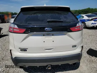 2019 Ford Edge SEL z VIN 2FMPK4J98KBB34524, wystawiony jako Copart lot #57313615 z przebiegiem 112 193 mil mil oraz Szkoda całkowita • Salvage title. Historia ofert i sprzedaży dostępna na DreamBid. Obrazek 6.