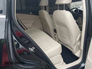 2012 Volkswagen Tiguan SE with VIN WVGAV7AX0CW602713, listed as a IAAI auction lot 41558520 with 95,678 mi miles and . Bid and sale history available at DreamBid. Image 8.