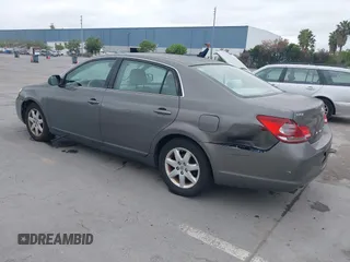 2007 Toyota Avalon XL with VIN 4T1BK36B47U175248, listed as a IAAI auction lot 42126427 with 144,284 mi miles. Bid and sale history available at carsss.com. Image 3.