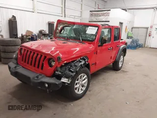 2023 Jeep Wrangler Sport S with VIN 1C4HJXDN1PW630003, listed as a IAAI auction lot 40989202 with 48,000 mi miles and . Bid and sale history available at DreamBid. Image 2.
