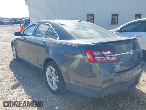 2015 Ford Taurus SEL with VIN 1FAHP2E87FG156969, listed as a IAAI auction lot 42506157 with 99,184 mi miles and . Bid and sale history available at DreamBid. Image 3.