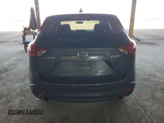 2013 Mazda CX-5 Sport with VIN JM3KE2BE0D0144630, listed as a Copart auction lot 64690215 with 155,155 mi miles and Clean title. Bid and sale history available at DreamBid. Image 6.
