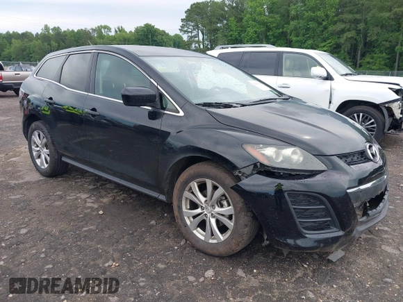 2011 Mazda CX-7 S Touring z VIN JM3ER4CL2B0362415, wystawiony jako IAAI lot #42214144 z przebiegiem 156 976 mil mil oraz . Historia ofert i sprzedaży dostępna na DreamBid. Obrazek 1.