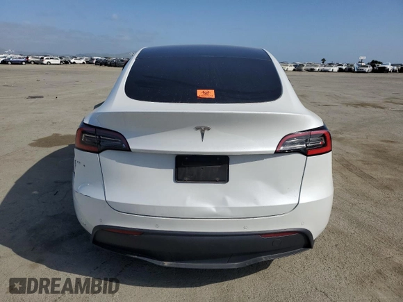 2021 Tesla Model Y Standard Range z VIN 5YJYGDED9MF110473, wystawiony jako Copart lot #53850085 z przebiegiem 46 242 mil mil oraz Szkoda całkowita • Salvage title. Historia ofert i sprzedaży dostępna na DreamBid. Obrazek 6.