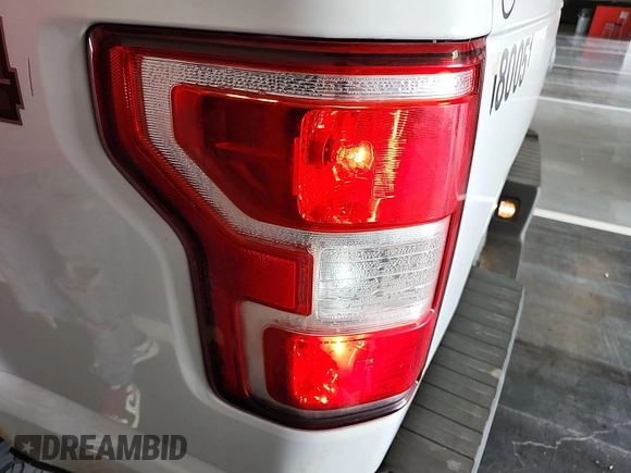 2018 Ford F-150 XL with VIN 1FTEX1EBXJKD47259, listed as a IAAI auction lot 42255419 with 239,502 mi miles and . Bid and sale history available at DreamBid. Image 17.