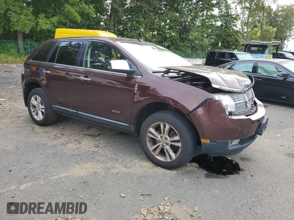 2010 Lincoln MKX with VIN 2LMDJ8JC9ABJ30736, listed as a Copart auction lot 71791594 with 116,083 mi miles and Salvage Title. Bid and sale history available at DreamBid. Image 4.