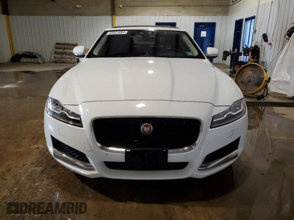 2016 Jaguar XF 35t Prestige with VIN SAJBK4BV7GCY15017, listed as a Copart auction lot 69323894 with 40,113 mi miles and Salvage Title. Bid and sale history available at carsss.com. Image 5.