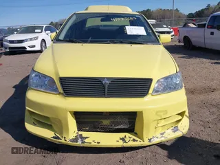 2002 Mitsubishi Lancer OZ-Rally with VIN JA3AJ86E32U081427, listed as a IAAI auction lot 41875587 with 190,214 mi miles. Bid and sale history available at carsss.com. Image 6.