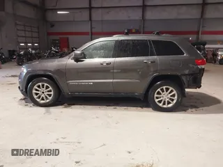 2014 Jeep Grand Cherokee Laredo with VIN 1C4RJEAG7EC145023, listed as a IAAI auction lot 40518825 with 115,098 mi miles and . Bid and sale history available at DreamBid. Image 14.