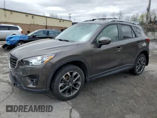 2016 Mazda CX-5 Grand Touring with VIN JM3KE4DY5G0848717, listed as a Copart auction lot 53249895 with 86,746 mi miles and Salvage Title. Bid and sale history available at carsss.com. Image 1.