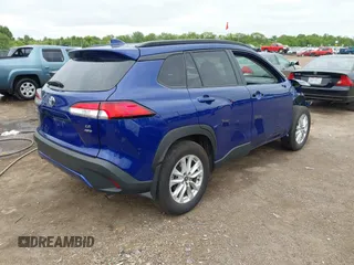 2022 Toyota Corolla Cross LE with VIN 7MUCAABG1NV042004, listed as a IAAI auction lot 42352160 with 58,442 mi miles and . Bid and sale history available at DreamBid. Image 4.