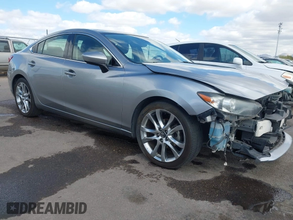2014 Mazda 6 i Grand Touring с VIN JM1GJ1W57E1104801, выставлен на аукционе IAAI как лот 42060144 с пробегом 95 212 миль миль и . История ставок и продаж доступна на DreamBid. Изображение 1.