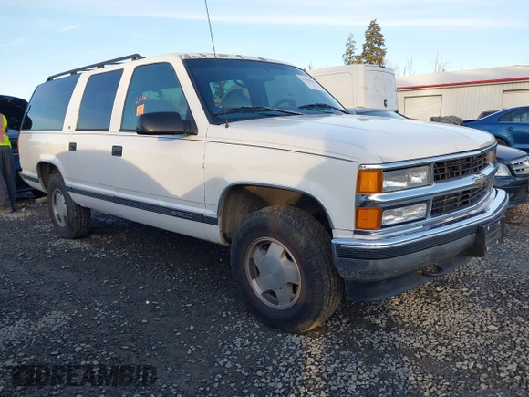 1997 Chevrolet Suburban with VIN 3GNFK16RXVG102805, listed as a IAAI auction lot 41559415 with 1 mi miles. Bid and sale history available at carsss.com. Image 1.