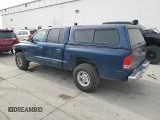 2002 Dodge Dakota SLT with VIN 1B7HG48N32S720700, listed as a Copart auction lot 80234494 with 207,035 mi miles and Salvage Title. Bid and sale history available at carsss.com. Image 2.