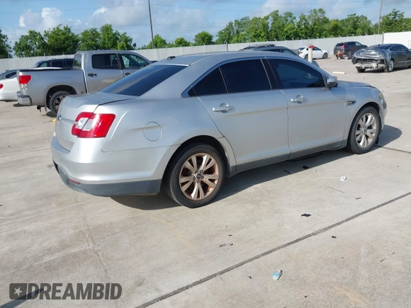 2012 Ford Taurus SEL z VIN 1FAHP2EWXCG136371, wystawiony jako IAAI lot #42455393 z przebiegiem 188 134 mil mil oraz . Historia ofert i sprzedaży dostępna na DreamBid. Obrazek 4.