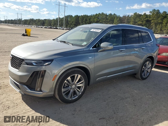 2023 Cadillac XT6 FWD Premium Luxury with VIN 1GYKPCRS0PZ231233, listed as a Copart auction lot 73210244 with 14,604 mi miles and Salvage Title. Bid and sale history available at carsss.com. Image 1.