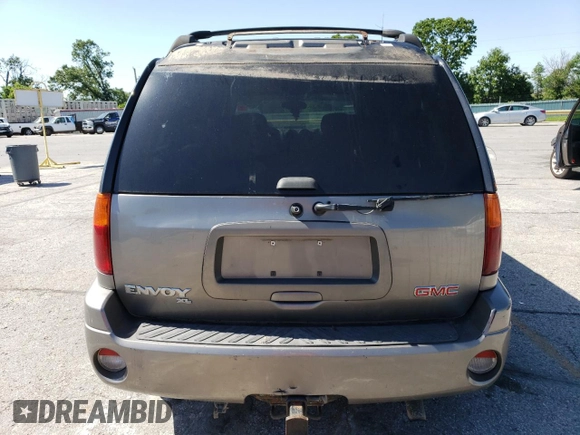 2005 GMC Envoy SLT z VIN 1GKET16M356134877, wystawiony jako Copart lot #57333345 z przebiegiem 205 714 mil mil oraz Szkoda całkowita • Salvage title. Historia ofert i sprzedaży dostępna na DreamBid. Obrazek 6.