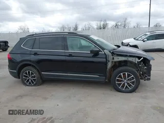 2020 Volkswagen Tiguan SE with VIN 3VV3B7AX7LM067046, listed as a IAAI auction lot 41697405 with 53,573 mi miles and . Bid and sale history available at DreamBid. Image 13.