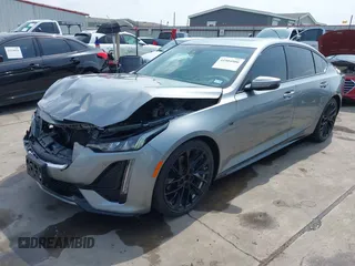 2023 Cadillac CT5 Sport z VIN 1G6DP5RK7P0113696, wystawiony jako IAAI lot #41904906 z przebiegiem 89 191 mil mil oraz . Historia ofert i sprzedaży dostępna na DreamBid. Obrazek 23.