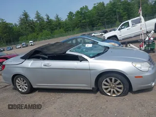 2010 Chrysler Sebring Touring z VIN 1C3BC5ED9AN201946, wystawiony jako IAAI lot #42430012 z przebiegiem 125 672 mil mil oraz . Historia ofert i sprzedaży dostępna na DreamBid. Obrazek 14.