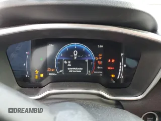2023 Toyota Corolla Cross XLE with VIN 7MUDAABG6PV078570, listed as a Copart auction lot 65246535 with 21,928 mi miles and Salvage title. Bid and sale history available at DreamBid. Image 9.