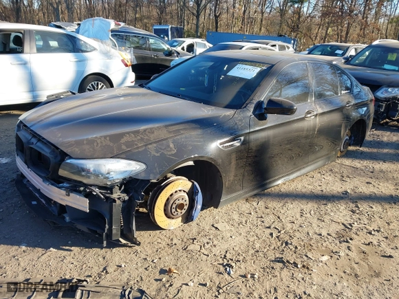 2014 BMW M5 with VIN WBSFV9C50ED097488, listed as a IAAI auction lot 41185321 with 72,891 mi miles. Bid and sale history available at carsss.com. Image 18.