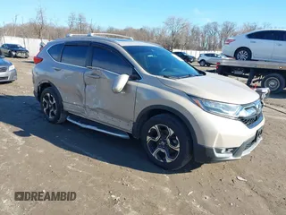 2017 Honda CR-V Touring with VIN 5J6RW2H94HL013536, listed as a IAAI auction lot 41577317 with 97,132 mi miles. Bid and sale history available at carsss.com. Image 1.