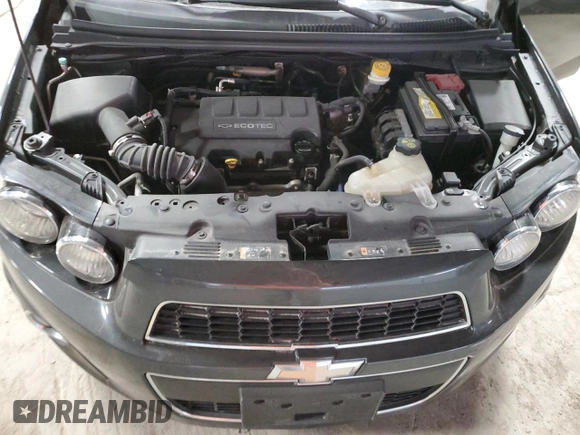 2014 Chevrolet Sonic LTZ z VIN 1G1JE6SB8E4233382, wystawiony jako Copart lot #48941115 z przebiegiem 95 876 mil mil oraz Szkoda całkowita • Salvage title. Historia ofert i sprzedaży dostępna na DreamBid. Obrazek 11.