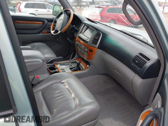 2004 Lexus LX 470 z VIN JTJHT00W143546192, wystawiony jako IAAI lot #41673810 z przebiegiem 232 196 mil mil oraz . Historia ofert i sprzedaży dostępna na DreamBid. Obrazek 5.
