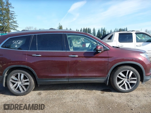 2016 Honda Pilot Touring with VIN 5FNYF6H99GB094933, listed as a IAAI auction lot 41967730 with 98,841 mi miles. Bid and sale history available at carsss.com. Image 13.