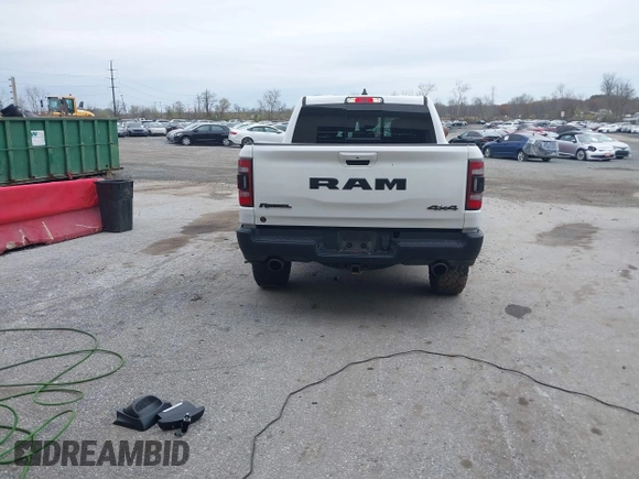 2022 Ram 1500 Rebel z VIN 1C6SRFLT1NN267513, wystawiony jako IAAI lot #41961821 z przebiegiem 140 488 mil mil oraz . Historia ofert i sprzedaży dostępna na DreamBid. Obrazek 17.