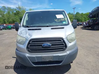 2015 Ford Transit Cargo with VIN 1FTNR1ZM5FKA40014, listed as a IAAI auction lot 42258737 with 177,501 mi miles and . Bid and sale history available at DreamBid. Image 12.
