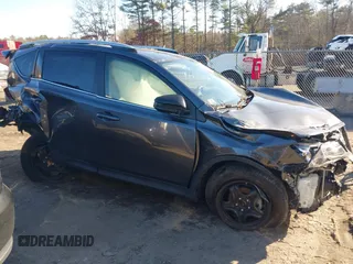 2014 Toyota RAV4 LE with VIN JTMBFREV9E5030687, listed as a IAAI auction lot 41095249 with 53,726 mi miles and . Bid and sale history available at DreamBid. Image 13.