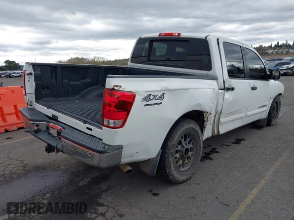 2013 Nissan Titan PRO-4X with VIN 1N6BA0EC9DN301669, listed as a IAAI auction lot 41868397 with 171,085 mi miles. Bid and sale history available at carsss.com. Image 4.