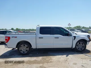 2023 Ford F-150 XL with VIN 1FTEW1CP5PKF42521, listed as a IAAI auction lot 42257062 with 30,758 mi miles and . Bid and sale history available at DreamBid. Image 13.