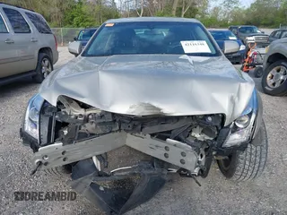 2014 Cadillac ATS Standard RWD z VIN 1G6AA5RA0E0103116, wystawiony jako IAAI lot #42116348 z przebiegiem 133 956 mil mil oraz . Historia ofert i sprzedaży dostępna na DreamBid. Obrazek 13.