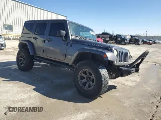 2014 Jeep Wrangler Unlimited Rubicon with VIN 1C4BJWFG0EL199649, listed as a Copart auction lot 47801775 with 141,116 mi miles and Salvage Title. Bid and sale history available at carsss.com. Image 4.