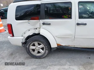 2007 Dodge Nitro SXT with VIN 1D8GU28K77W727391, listed as a IAAI auction lot 41869288 with 214,920 mi miles. Bid and sale history available at carsss.com. Image 18.