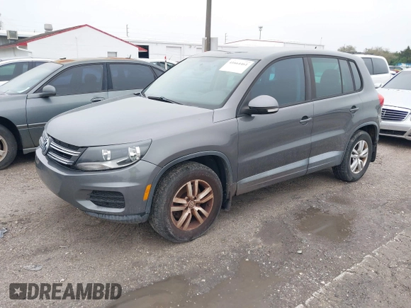 2012 Volkswagen Tiguan LE z VIN WVGAV7AX9CW096668, wystawiony jako IAAI lot #41664461 z przebiegiem 161 725 mil mil oraz . Historia ofert i sprzedaży dostępna na DreamBid. Obrazek 2.
