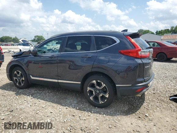 2018 Honda CR-V Touring with VIN 2HKRW2H9XJH605264, listed as a Copart auction lot 61500315 with 106,616 mi miles and Salvage title. Bid and sale history available at DreamBid. Image 2.