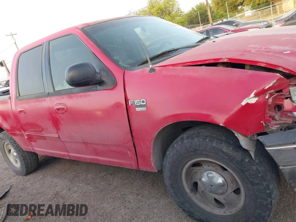 2001 Ford F-150 XLT with VIN 1FTRW07W61KF51667, listed as a IAAI auction lot 41846904 with 187,076 mi miles and . Bid and sale history available at DreamBid. Image 14.